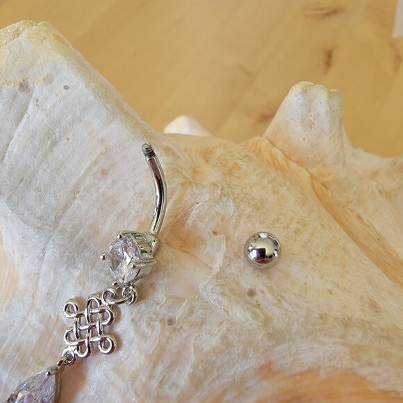 14G dangle belly button ring with decorative celtic shape charm in clear CZ - Picture 5 of 5